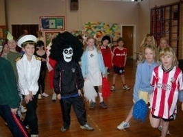 &nbsp;Children prepare for a cross country run in aid of Children in Need.