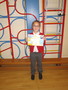 Millie received a swimming certificate.