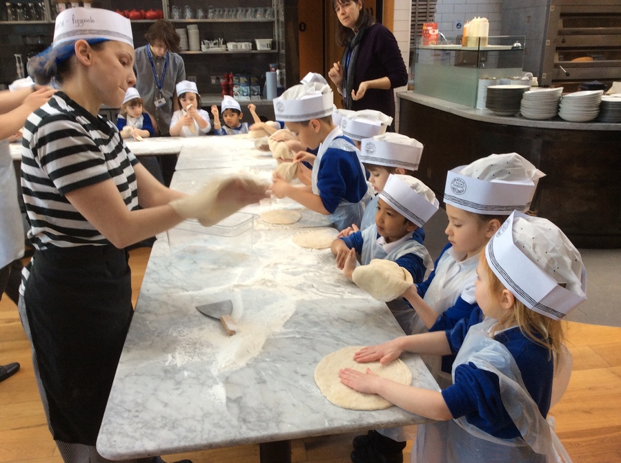 Stretching the dough.