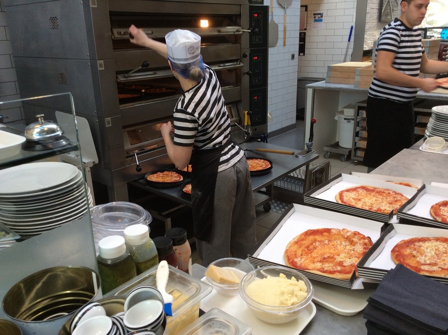 Baking in the pizza oven.