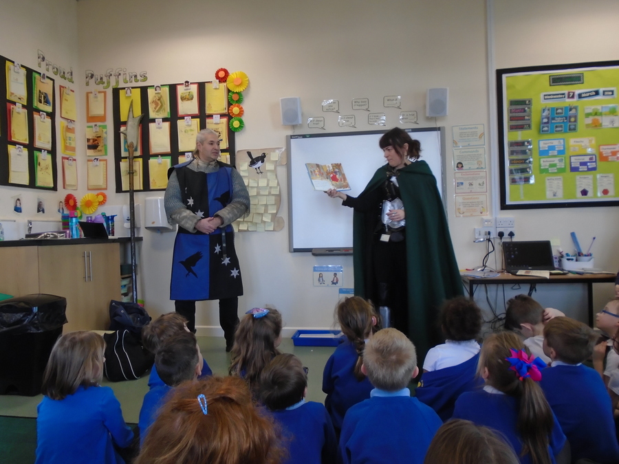 A medieval knight came to school and showed us how to fight like a knight with long swords.