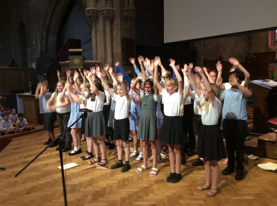 Singing 'Reach' whilst reaching for the stars.