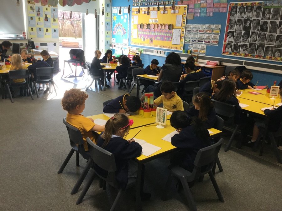 1B listening to calming music as they work on their handwriting for BBC Music Day
