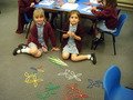 <span style="color: rgb(34, 34, 34); font-family: arial, sans-serif; font-size: 12.8px; text-align: start; display: inline !important;">We worked as a team to build shapes with straws and connectors.</span>