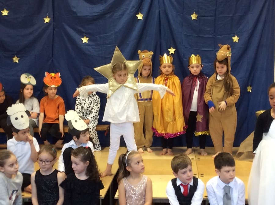 A star appeared in the sky and led the camels, with their knobble knees and the three Kings to the stable.