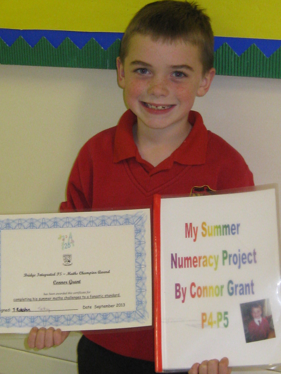  Conor Grant wins a special prize and certificate for completing the Maths summer challenge.  He found numbers in a variety of amazing places.  Well done Conor! 