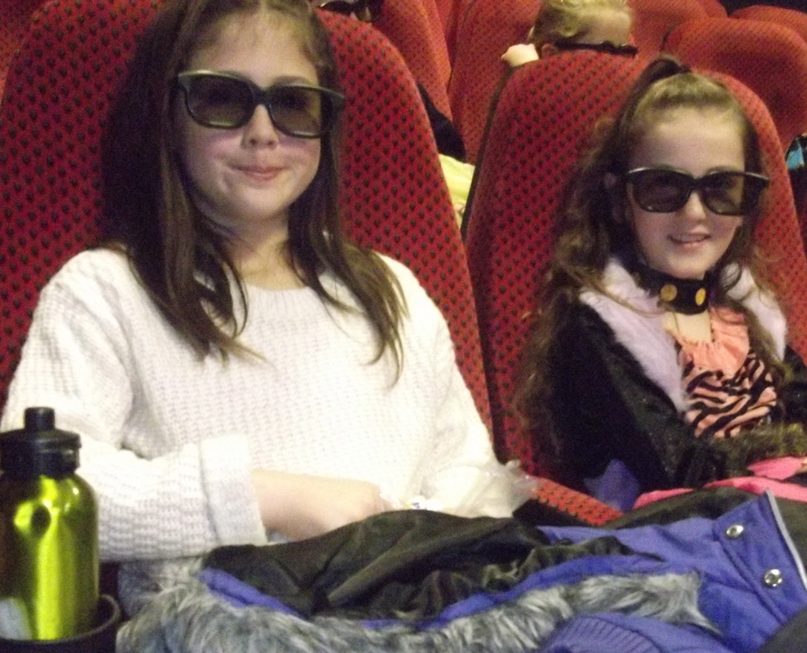 Toya and Ellie get comfortable before the movie starts.