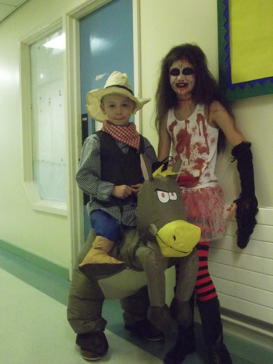 Well done to Allister P.5D and Lucy P.6T Winners of the Best Dressed Costume at the school disco. 