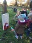 putting poppies down on remembrance day.jpg