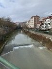 Grevena river and modern homes.JPG