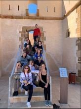 Lorca adults on stairs of castle.JPG