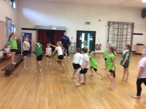 Year 2 showing us their new skills in a competitve game of Benchball!