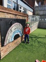 Week 1: We painted chalk boards in the infants - and chalked a rainbow to cheer our day.