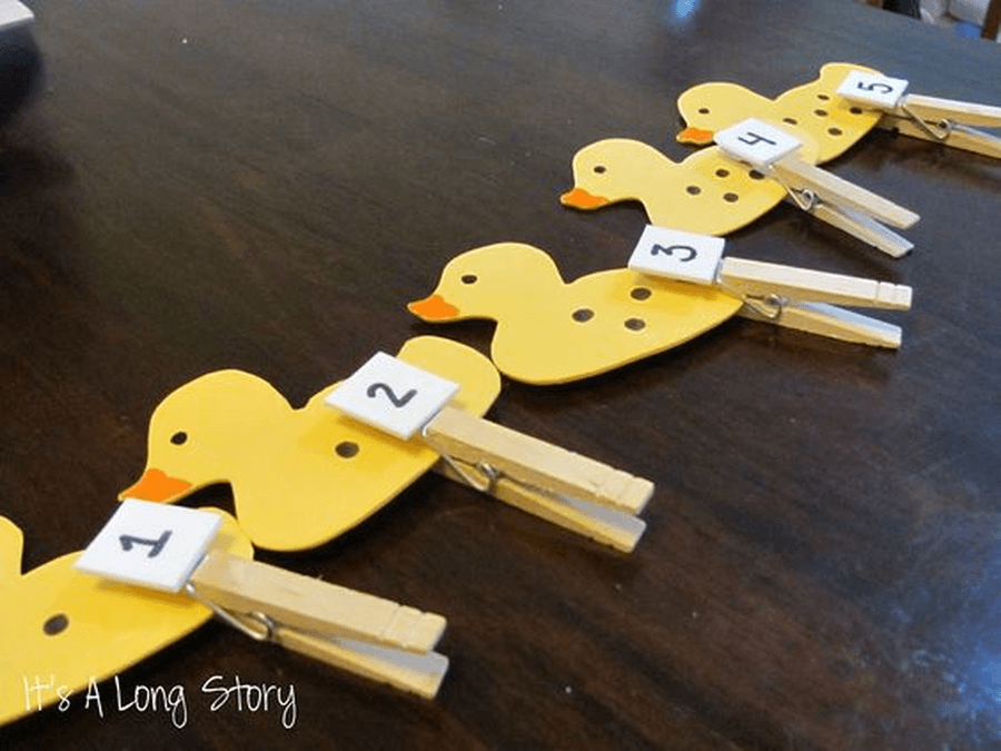 Draw dots on your Five Little Ducks and then add the right number of clothes pegs to match the numbers or write the number on the peg and match them up.