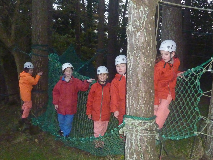 Eva leads the way on this part of the ropes course.