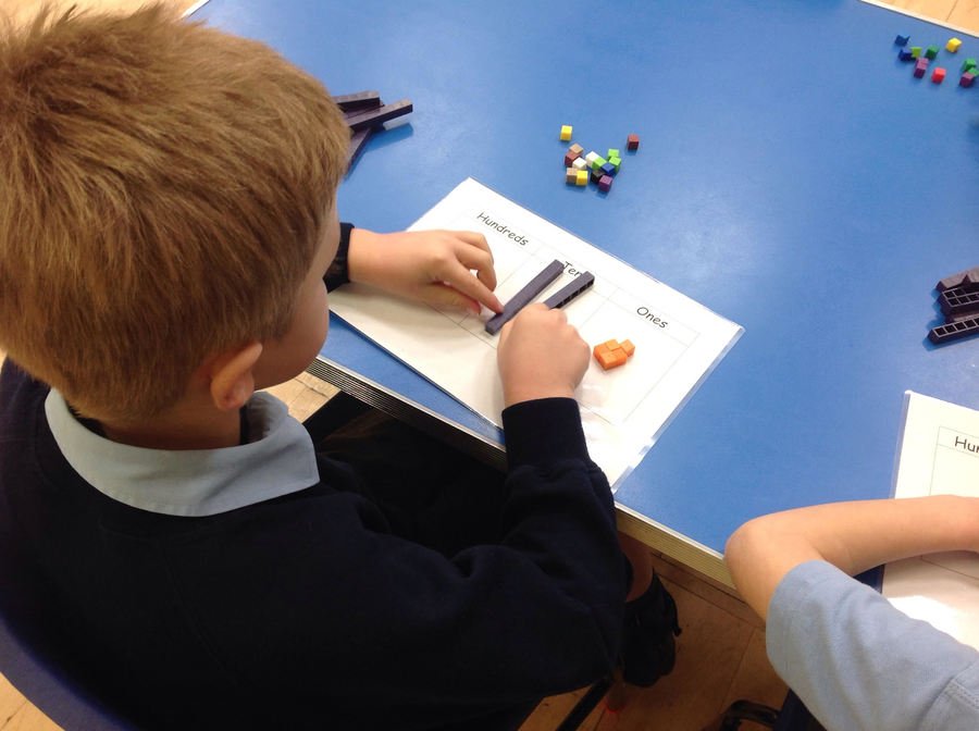 Children use a variety of manipulatives to develop security in maths across all year groups. 