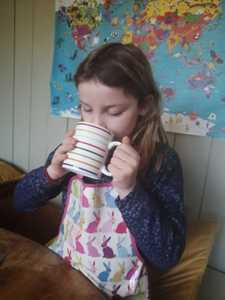 Edie trying her hot cocoa