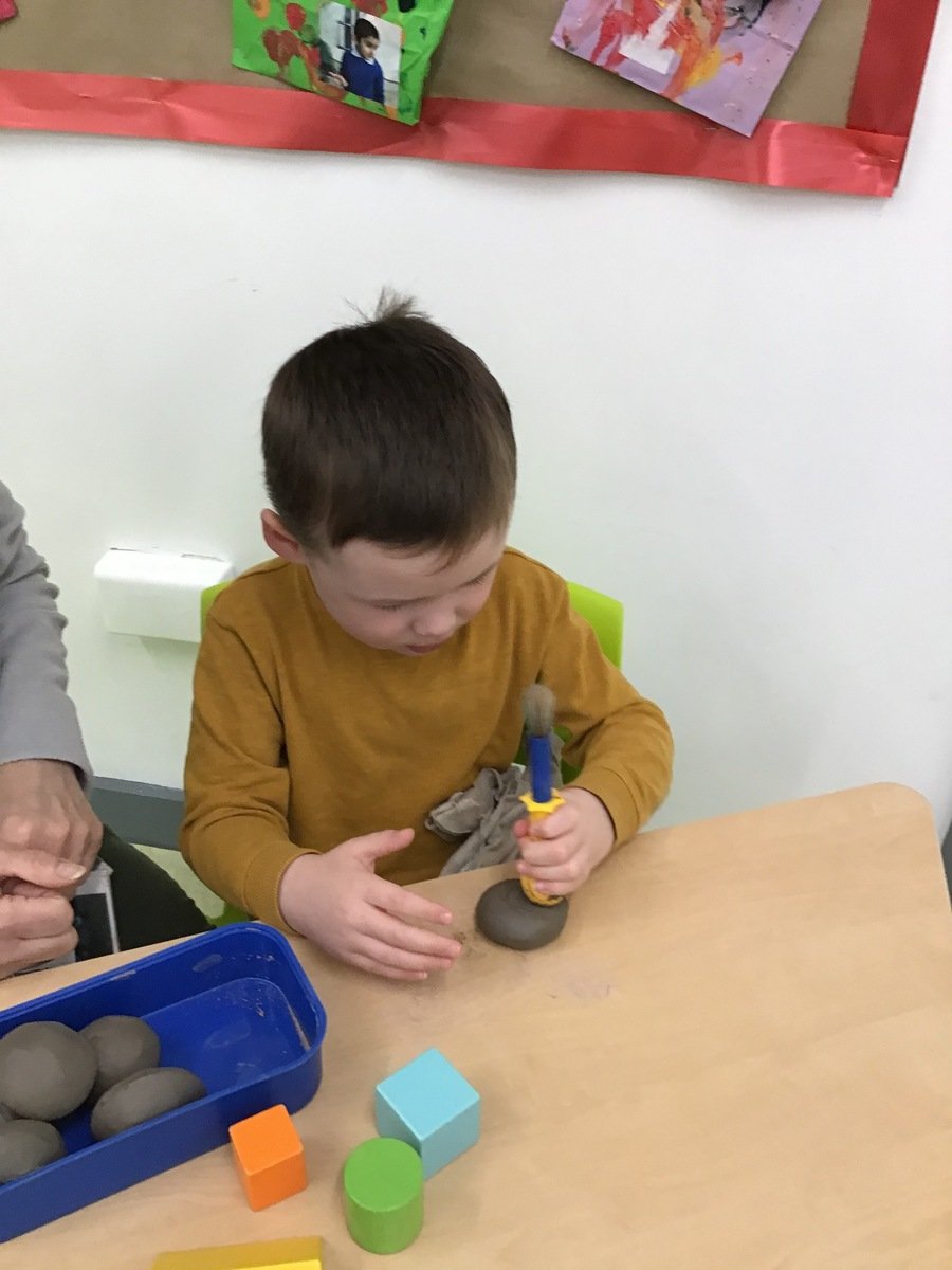 R enjoyed exploring the clay. He worked really hard to mould it, shape it and make an indentation in the middle to place a tealight.