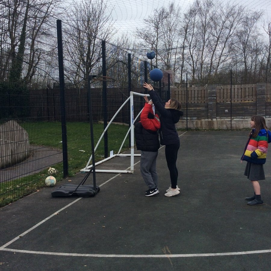 W is a Year 6 pupil, pathway 2 who was able to shoot the basketball into the hoop with support. Great work!