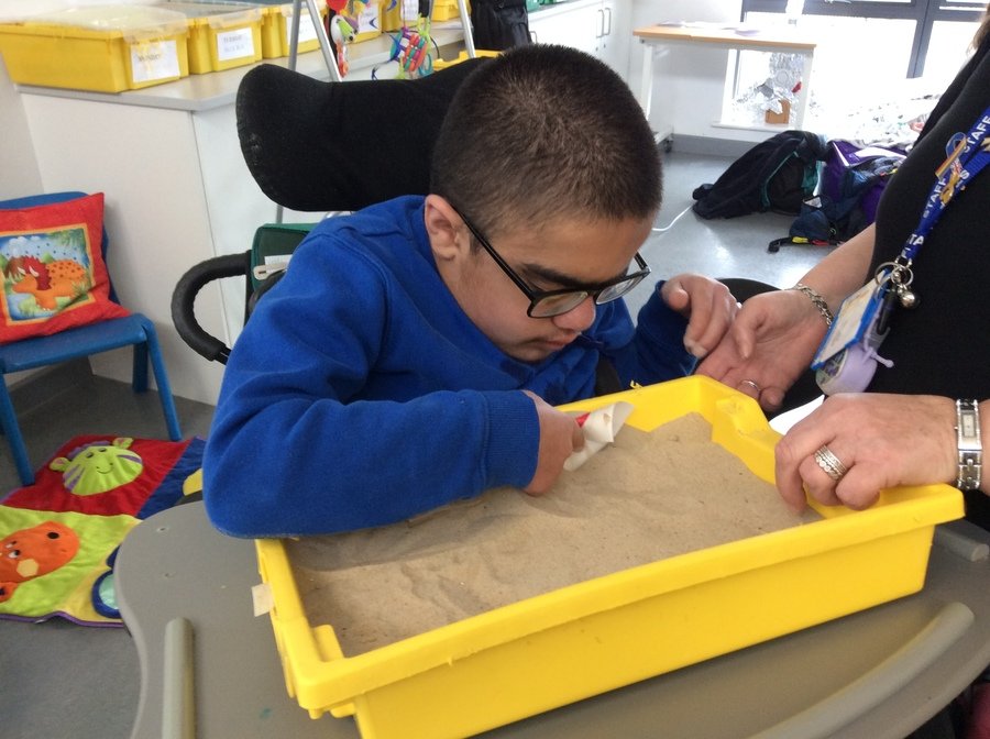 A. is a year 6 pupil working in pathway 1. He independently located two Easter eggs hidden in a sensory tray during our Easter themed counting activity. 