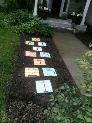 Make a hopscotch using numbers or letters!