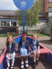 Blue summer dresses and navy cardigans with or without the school logo.