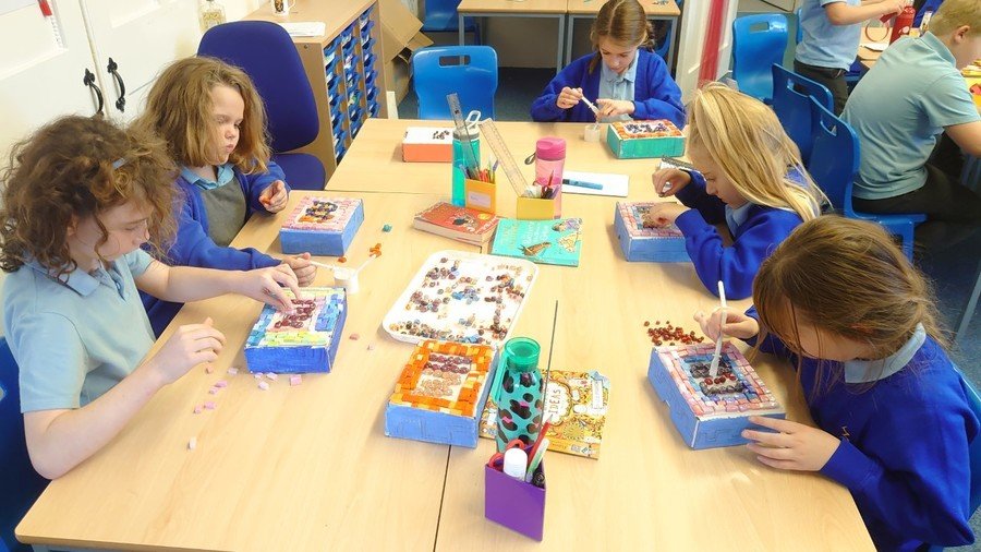 A quick photo opportunity with the children creating mosaics