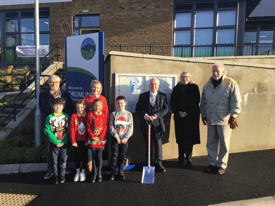 David Cole-Baker, Chairman of the Board of Governors; Kara Kirkpatrick, Eco Club leader & P5 Teacher; Dr Terry Cross; Janice Marshall, Principal; Brian Small, Integrated Education Fund and members of the school's Eco Club