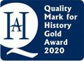 Quality-Mark-logo-gold-20-500x362.jpg