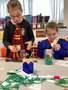 Y1 working very hard on our story jars