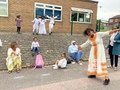 Pupils & Parents enjoying the Food.JPG