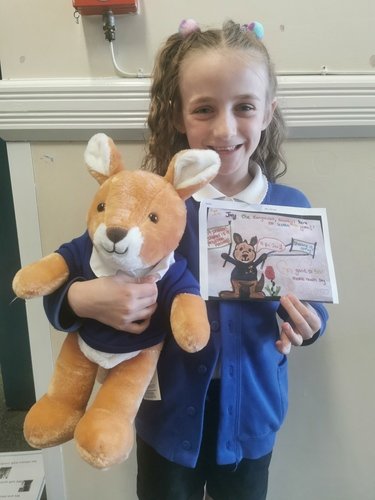 Mollie with her winning entry for the Mental Health Mascot Competition