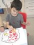 Adam- Art Lesson- Mixing two colours on Elephant.JPG