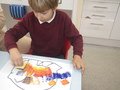 Sebastian-Art Lesson-Elephant mixing with Paint.JPG