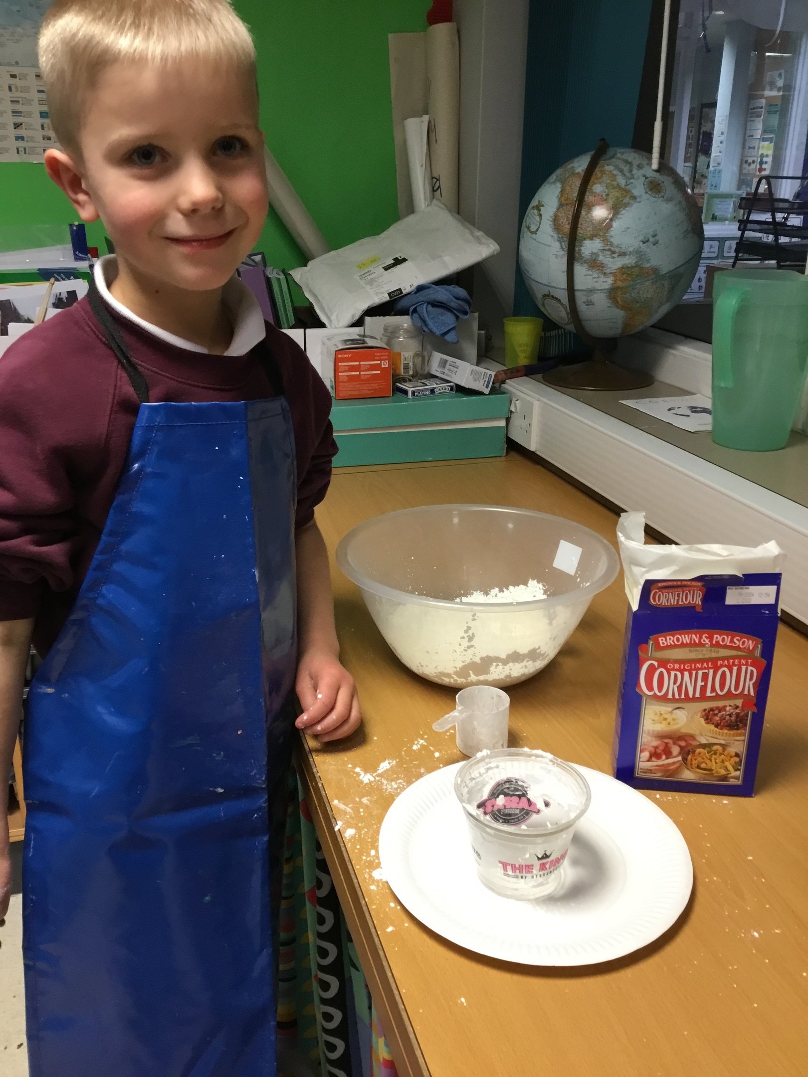 Measuring the ingredients for cloud dough.