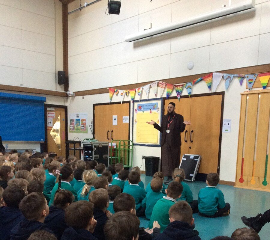 School Assembly with Muslim Visitor: Imam Hassan