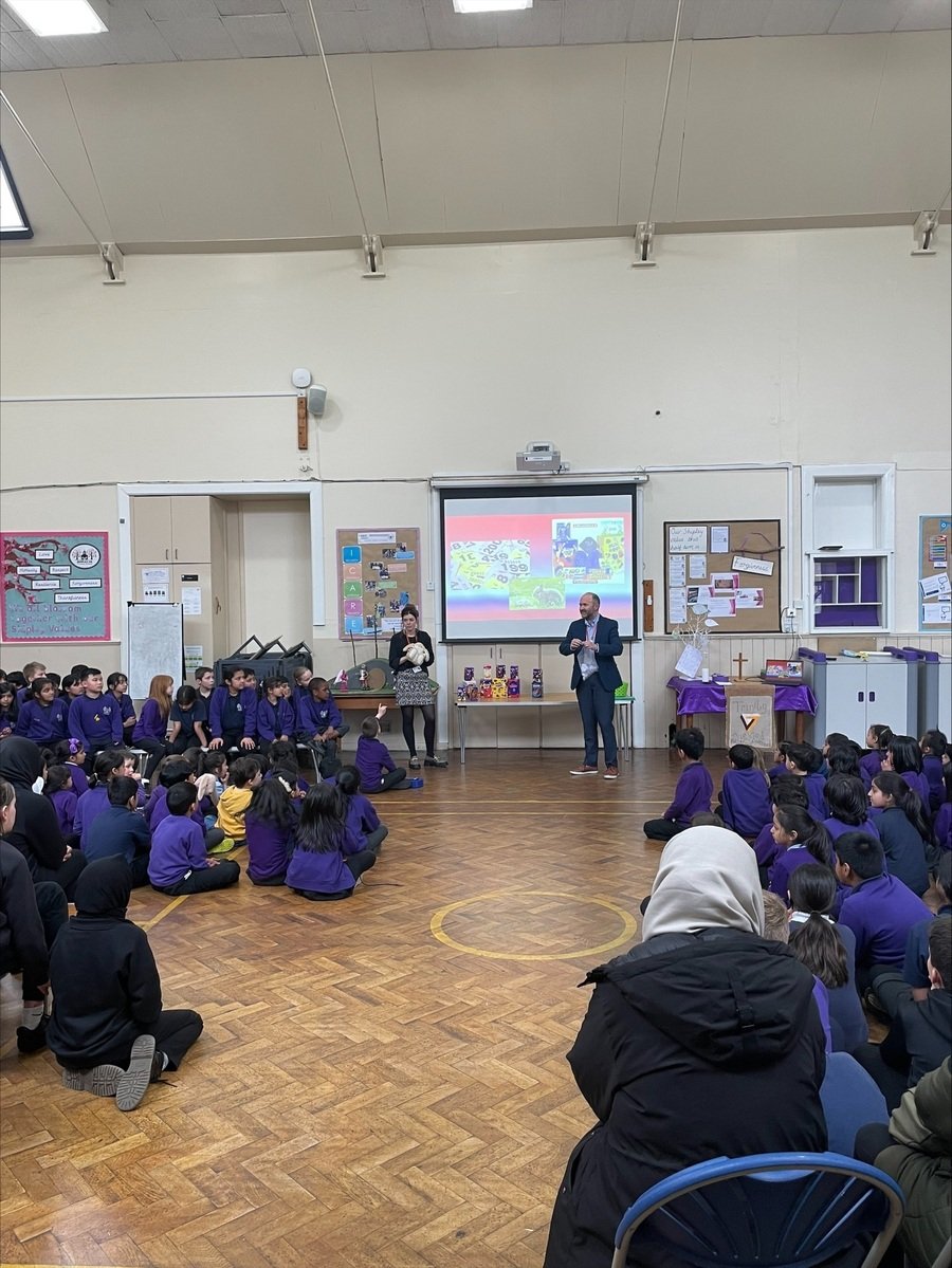 Mr Hamilton and Mrs Cowen awarding raffle prizes. Our parent group helped promote our raffle and the collection of prizes.