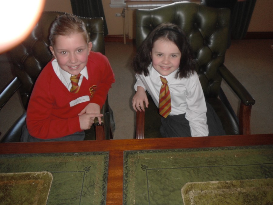 Lucy and Cara relaxing in the BDC Councillors' chairs after presenting their speeches!