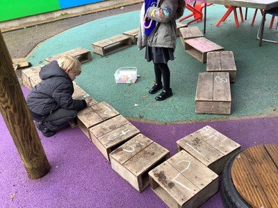 Counting with blocks in the EYFS Garden.jpg