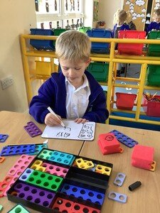 Using numicon to make larger numbers.jpg