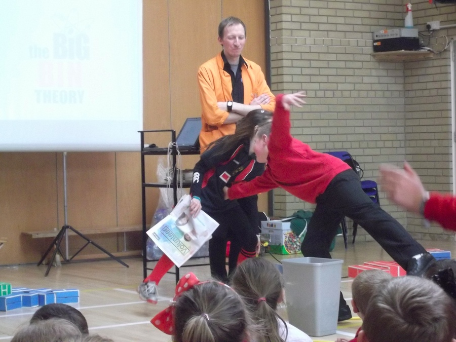 Daniel, the black bin demon tries to stop Lucy from recycling!