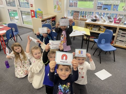 Year 1 go on a materials hunt around the school before sorting their finds.