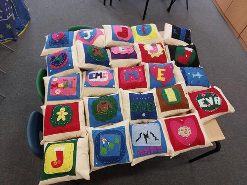 Year 2 & 3 design and sew their own cushions.