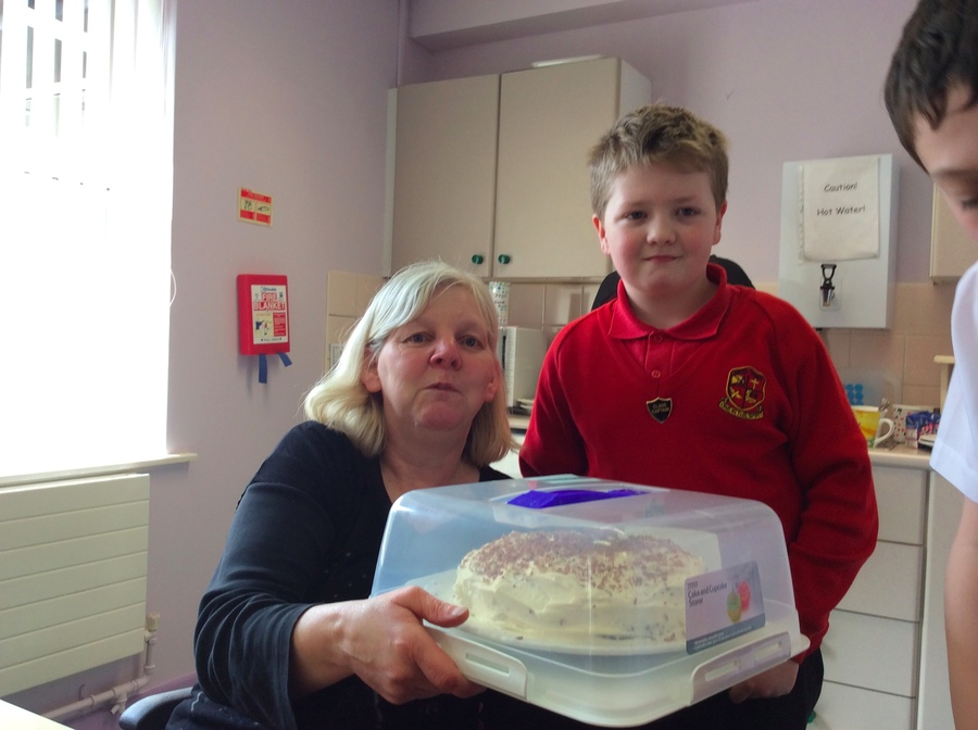 Mrs Woods was the lucky winner of Tristan's white chocolate cake!