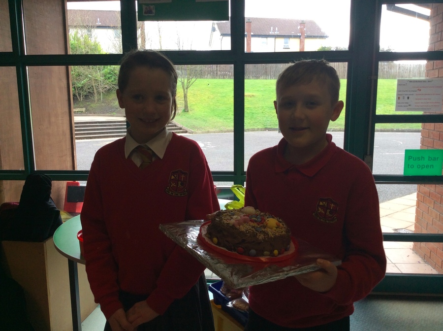 Ryan is delighted to take home Olivia's delicious chocolate cake - just in time for his big brother's birthday!  Kind thoughts earlier in the day must have brought him luck!