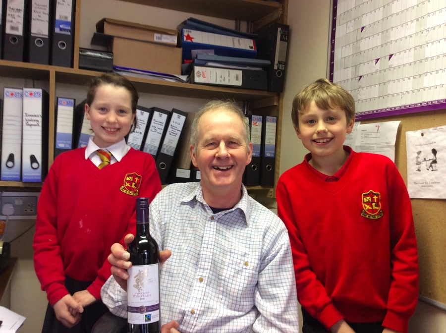 Mr McBride was the lucky winner of a Fairtrade bottle of wine in a staff draw.  this wine was kindly donated by Olivia's parents. 