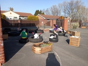 Year 3 relaxing with a book outside 8.jpg