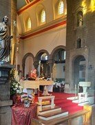 The choir singing at the parish International Mass