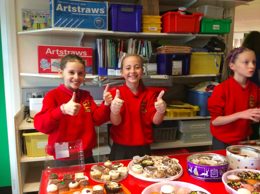 Thumbs up girls…all ready to sell!