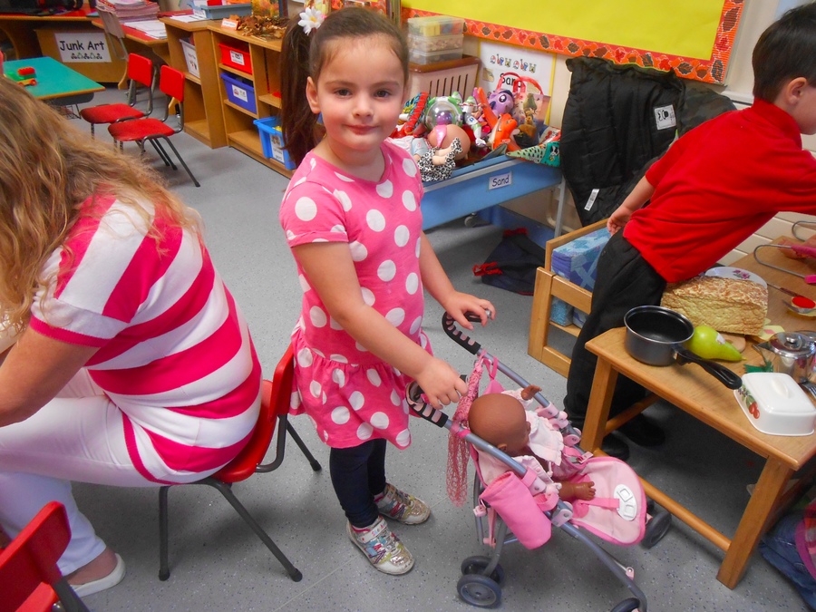 Zara pushes a pink pram too!